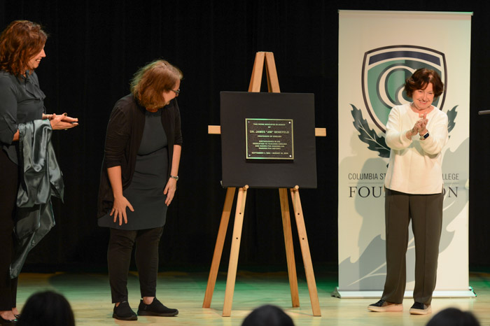 Pictured (left to right): Dr. James Senefeld's daughters Rachel Senefeld Kromer and Emily Senefeld, Columbia State instructor of history, and Dr. Janet F. Smith, Columbia State president. All three helped unveil the new naming plaque that now sits outside Clement 114, dedicated to Dr. Senefeld.